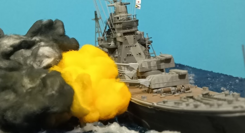 Recreated Godzilla Minus One encounter using a 1/350 Takao heavy cruiser model, showing camouflage and cinematic composition.