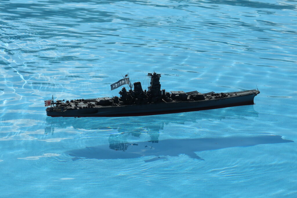 Radio-controlled 1/350 scale battleship Yamato Kai operating on water during navigation test.