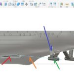 Annotated Fusion 360 view of a 1/150 Yukikaze RC stern showing shaft line, shaft boss, support plate, bracket, and rudder stock tube.