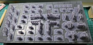 ABS-like resin build plate with small fittings for a 1/150 IJN destroyer Yukikaze, including machine guns, radar parts, and deck equipment printed with supports