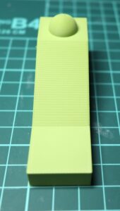 FDM test piece printed at 0.20mm layer height showing visible layer lines on the slope and dome