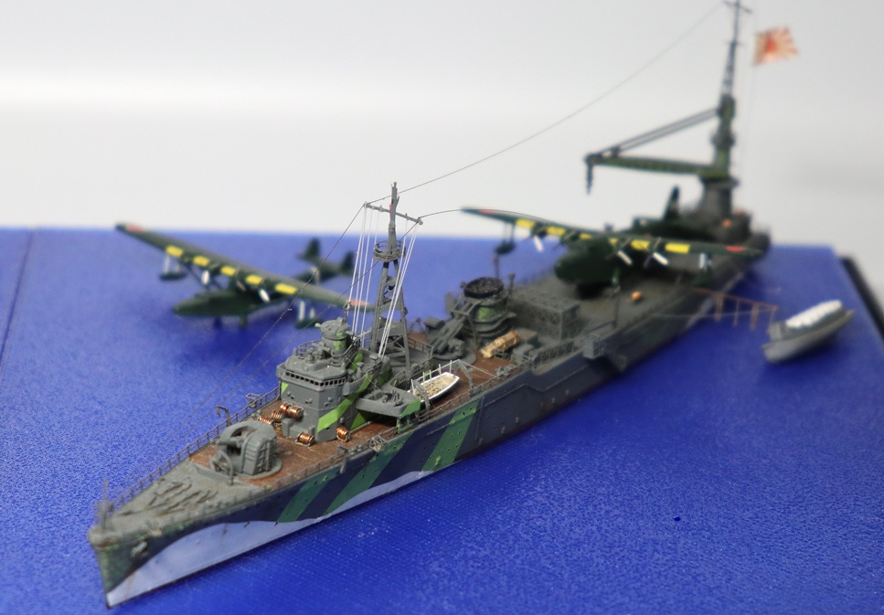 Akitsushima ship model displayed on a transparent PETG water surface sheet